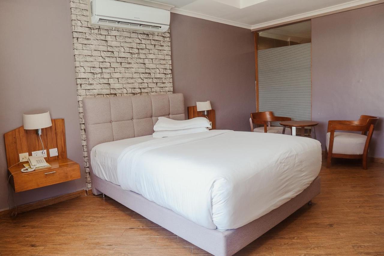 Tanga Beach Resort & Spa Luaran gambar